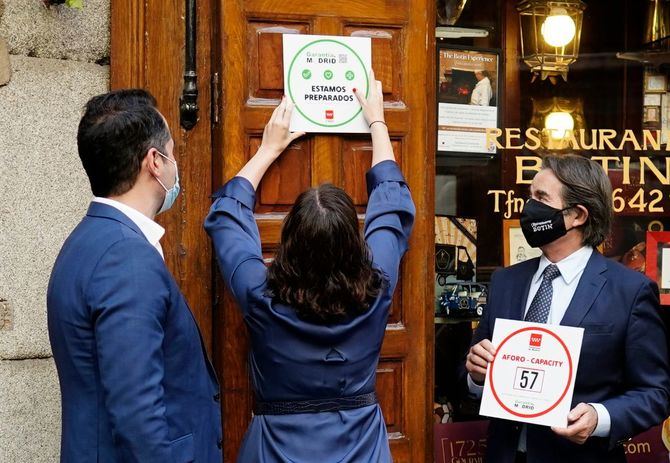 Los establecimientos que, como Casa Botín, obtengan el sello 'Garantía Madrid' recibirán un adhesivo para mostrar en un lugar visible de su acceso el límite de aforo del local acreditando su compromiso contra el coronavirus. 